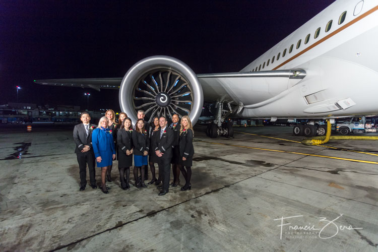 The flight crew posed for a portrait before departure.
