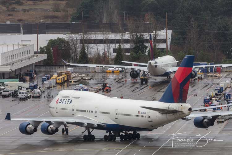 For a while, there were two Delta 747-400s at Sea-Tac. This one landed a few minutes before the farewell tour and was parked inside a maintenance hangar as a centerpiece for a party. It was later used to fly the Seattle Seahawks to a game someplace (we're not sportsball fans here at AirlineReporter - we only pay attention to the planes).