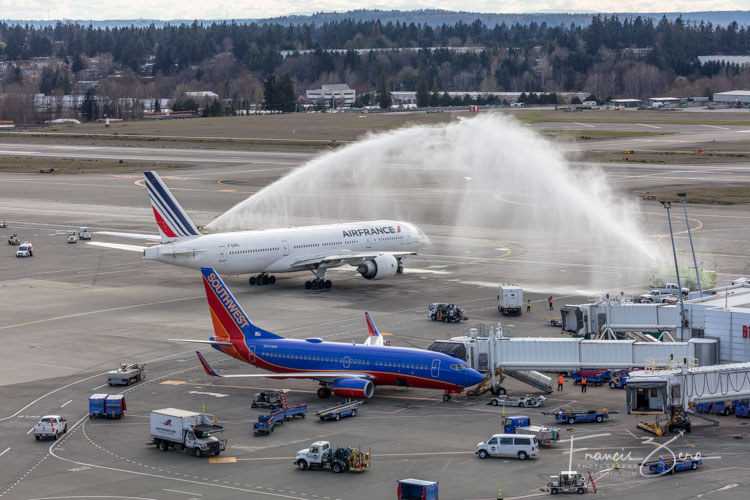 The jet also received a water-cannon salute as it left the terminal on the return flight to Paris