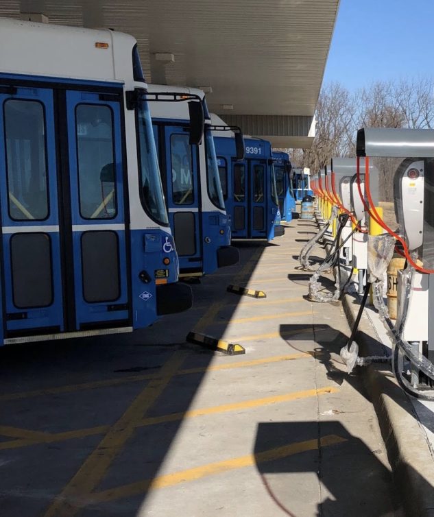 The fleet of electric buses prior to deployment. Note the chargers. - Photo: Kansas City Aviation Department