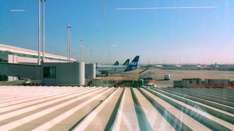 One of these things is not like the other: Joon's Airbus 321-200 sticks out among the Alitalia planes at FCO.