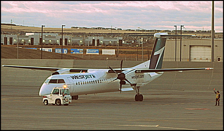 WestJet Encore Q400 Pushing Back at YYC