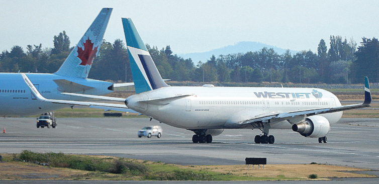 A WestJet 767 taxiing at YVR