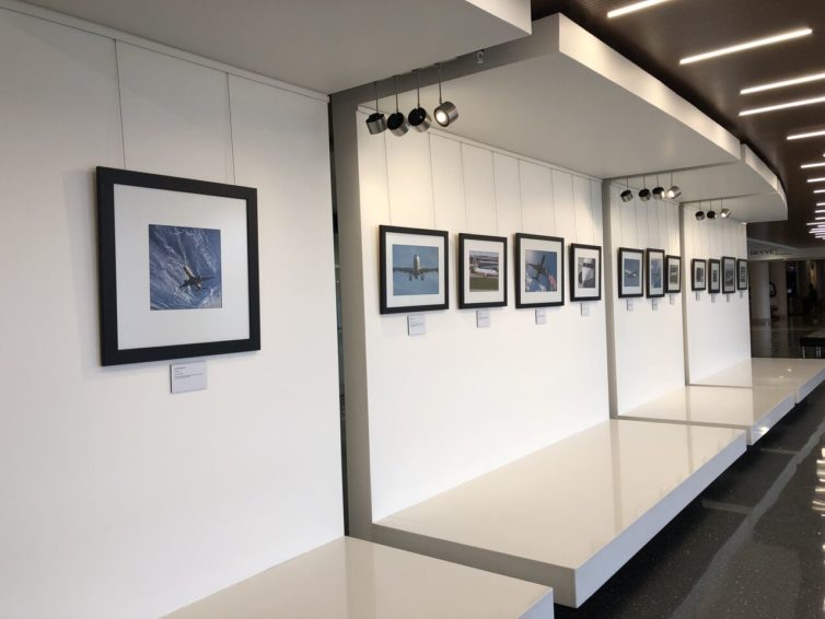 A selection of AvGeek art on display in TPA's gallery. - Photo: TPA Airport.