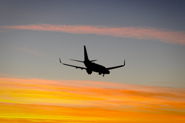 A Continental 737 (N13716) lands into the sunset at IAH in late 2010. - Photo: JL Johnson