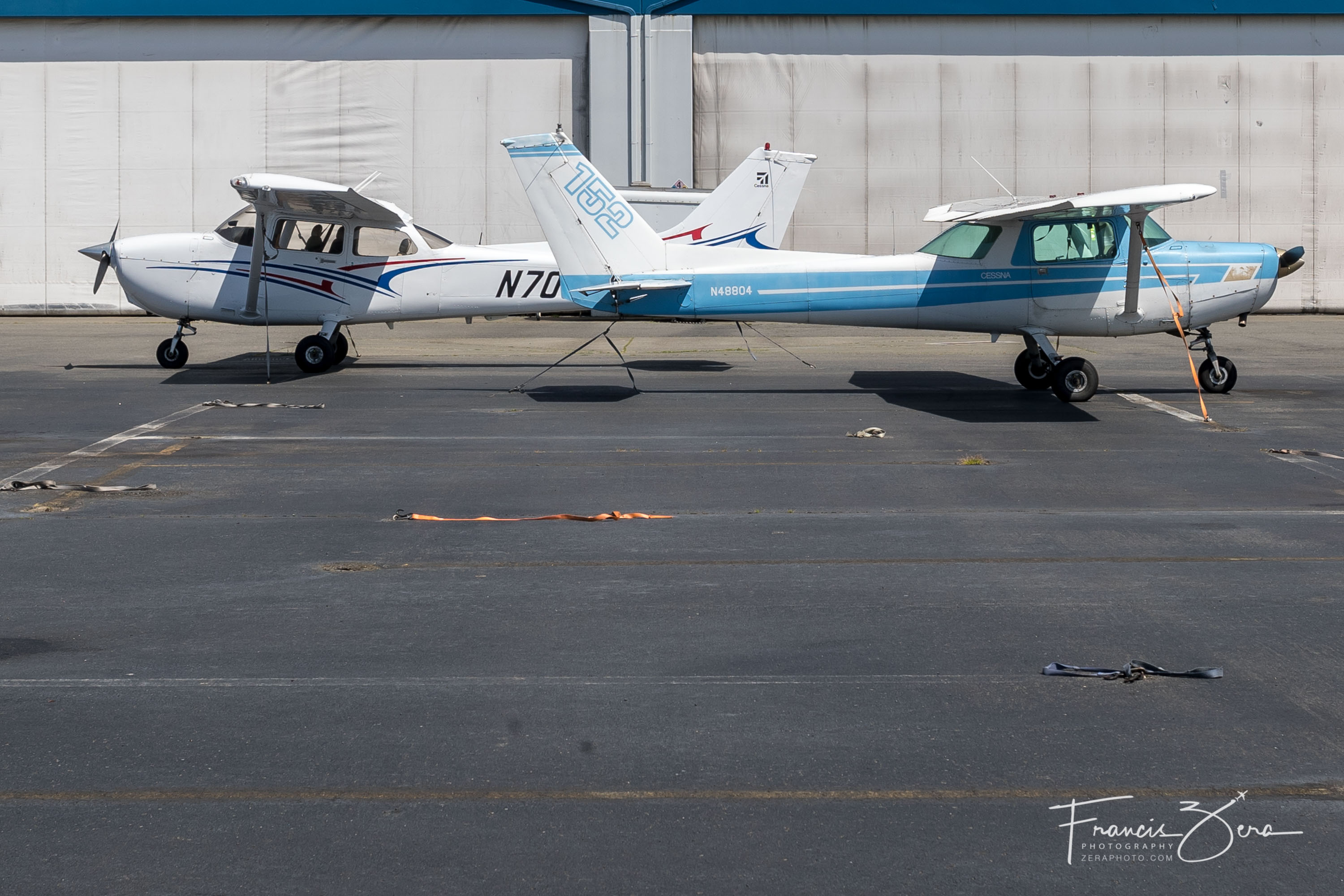 A two-seat Cessna 152 (foreground) and a four-seat Cessna 172 (background) on the Galvin ramp at BFI.