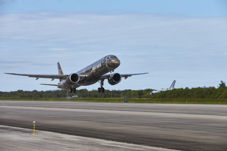 I am up front, smiling my little AvGeek butt off! - Orig photo: Embraer