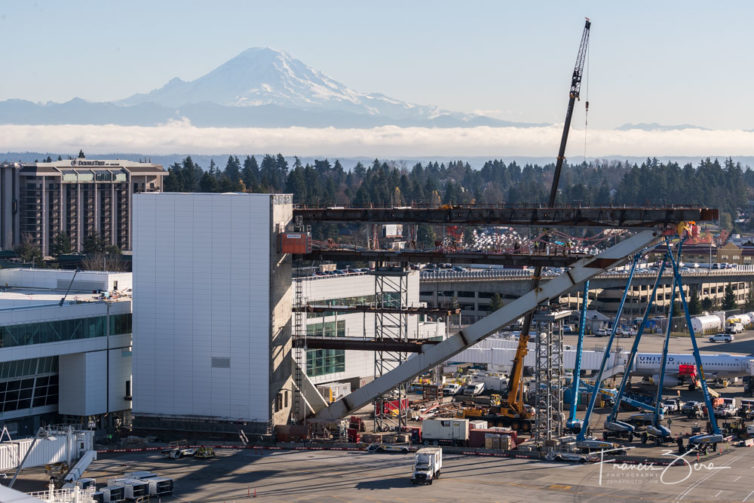 The main-terminal side of the forthcoming pedestrian bridge from SEA's south satellite terminal will feature epic views of Mount Rainier, at least when it's not raining. This photo is from Nov. 21, 2019.