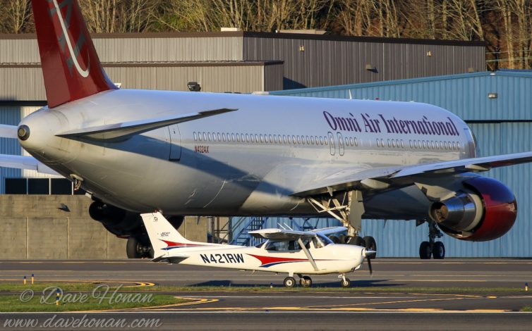 The Cessna 172 feels reasonably big until you taxi past a 767. Photo by Dave Honan