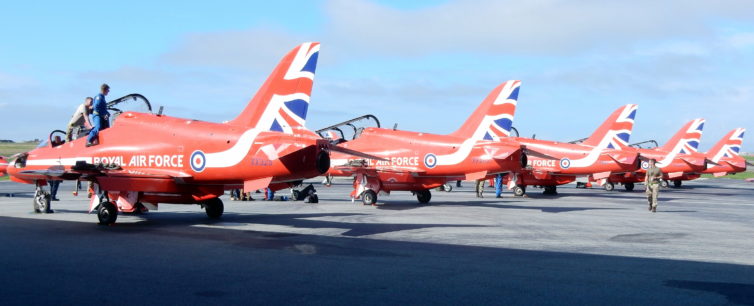 Four Red Arrows Hawks lined up at YVR, including Red 5 flown by Squadron Leader Steve Morris.