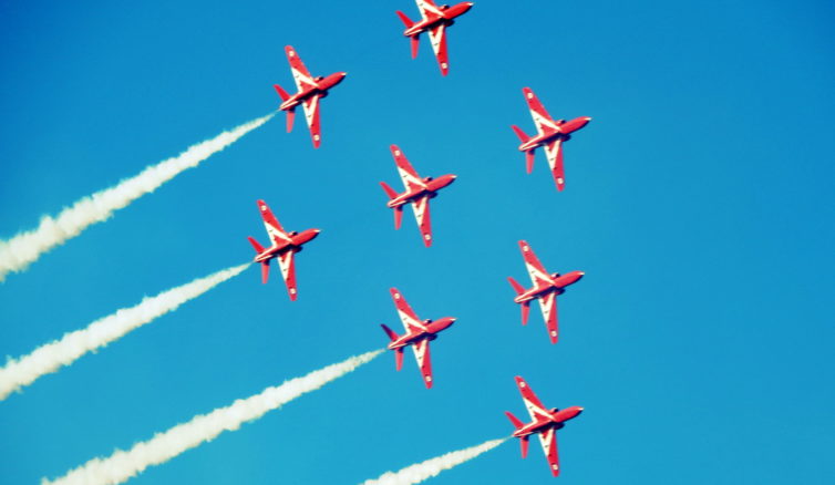 Red Arrows performing their trademark Diamond Maneuver.