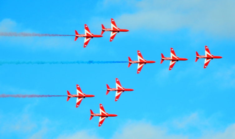 One Aircraft Short: The Red Arrows seen performing their "Concorde" maneuver.