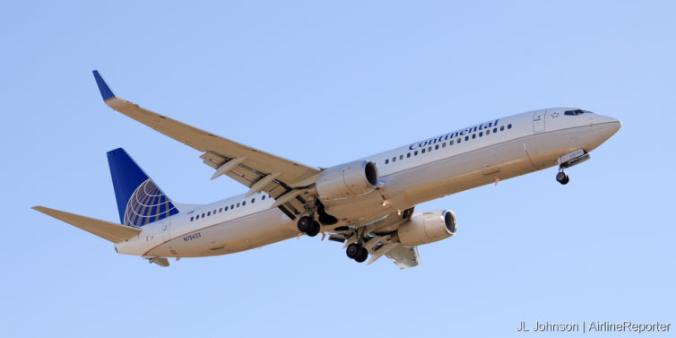 N75433, a shiny, less than two-years old Boeing 737-900ER spotted in Houston, December, 2010.