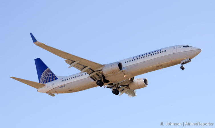 N75433, a shiny, less than two-years old Boeing 737-900ER seen at IAH in December, 2010.