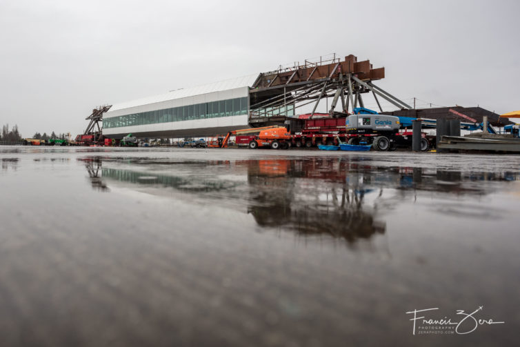 The pre-assembled bridge span at NE cargo, waiting transport to the other end of the airport for installation.