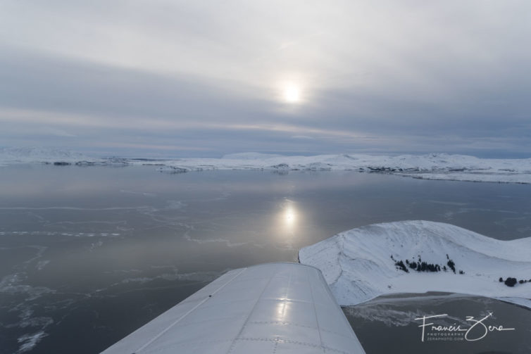 Flying over frozen Lake Ãžingvallavatn