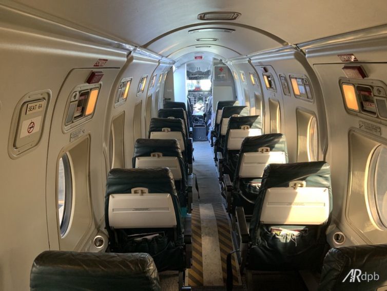 The cabin of the Beechcraft 1900D. Notice the little step up for the wingspar in the middle.