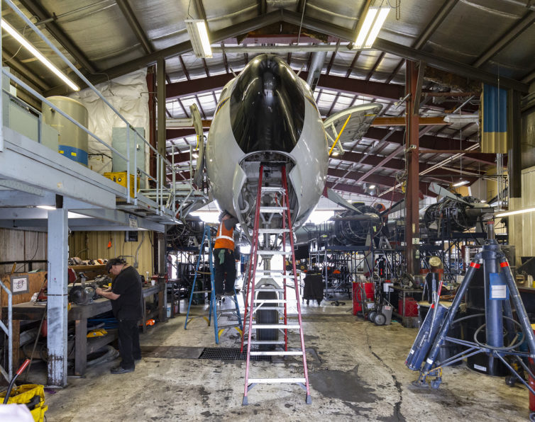 DC-6 N251CE getting worked on inside the Everts Air hangar in Fairbanks, AK.