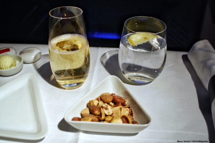 Austrian Airlines business class sparkling wine and nuts