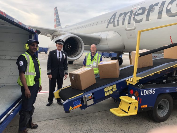 AA CLT-team-members-unload-care-packages-arriving-from-DFW