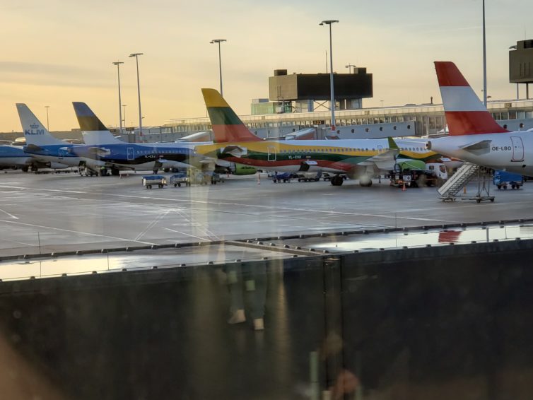 As I walking to the KLM lounge, I turned around to snap this picture of airBaltic's A220s. These are two of the three planes that have a special livery, the third features the flag of Latvia. Photo: Jonathan Trent-Carlson