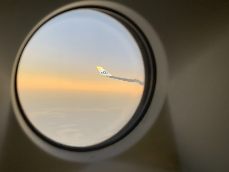 Sunset views, taken through a door porthole nearing Kigali. - Photo: Matthew Chasmar