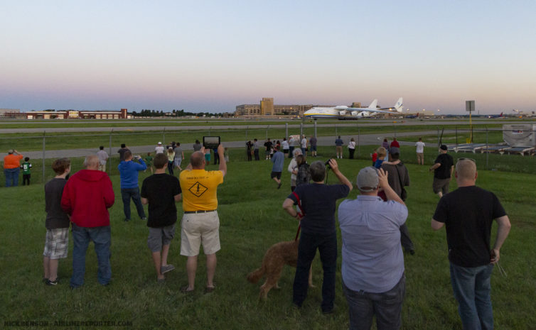 The An-225 lumbers along as onlookers enjoy the show. Thousands of people came to MSP to see this departure. Photo: Nick Benson