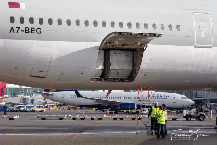 The 773's cargo hold was filled with containers. Qatar flies the large jets, in part, to maximize its cargo-handling opportunities