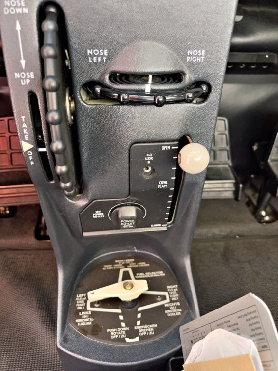 The C182T has a few more knobs and levers than the 172 to control the propeller and cowl flaps. There's also an additional dial for rudder trim.