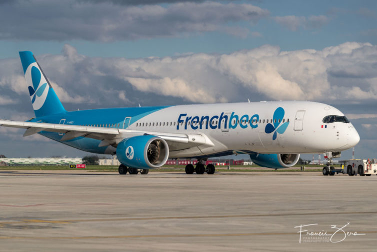 A French Bee A350 gets pushed back from the gate at Paris Orly airport