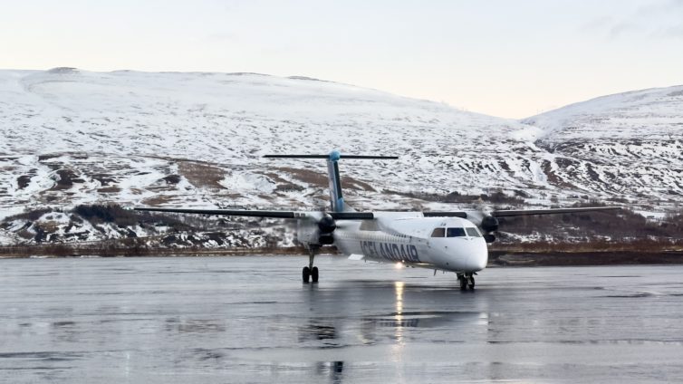 An Icelandair Connect De Havilland Canada DHC-8, better knows as a Q400 or Dash 8, taxies to the ramp in Akureyri, Iceland 