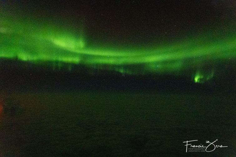 Yes, you can see the aurora from a plane; just sit on the north side and keep looking out the window