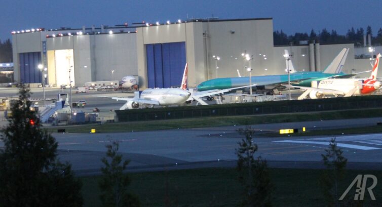 It's starting to get dark and a 777 was moved across the tarmac.