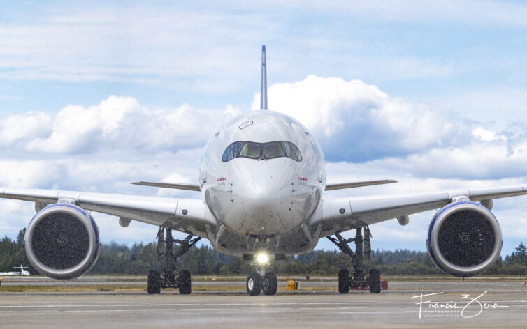 A head-on view of an SAS A350 taxiing on a ramp at SEA