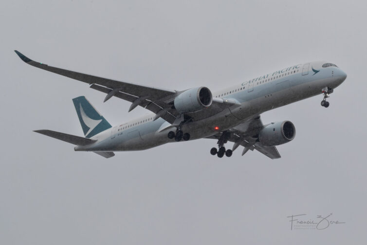 A Cathay Pacific A350 (B-LOD) on final to SEA on a rainy Pacific Northwest morning.